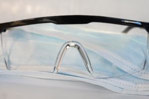 Wearing Sunglasses and Plastic eye Shields